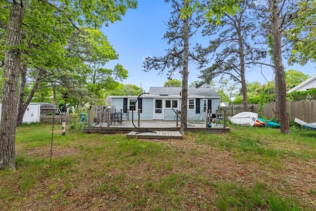 64 Bayside Dr, Falmouth, MA 02540 - back of property featuring a wooden deck