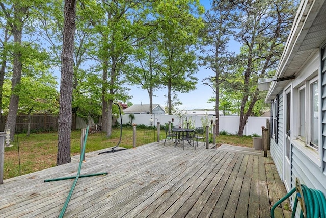 64 Bayside Dr, Falmouth, MA 02540 - wooden deck featuring outdoor dining area