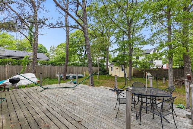 64 Bayside Dr, Falmouth, MA 02540 - wooden terrace with outdoor dining area