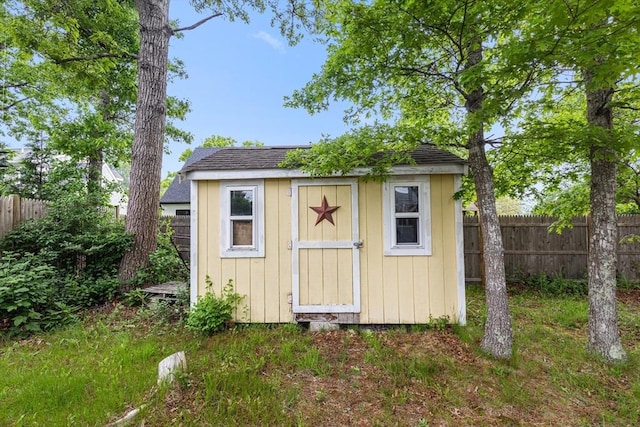 64 Bayside Dr, Falmouth, MA 02540 - view of shed with a fenced backyard