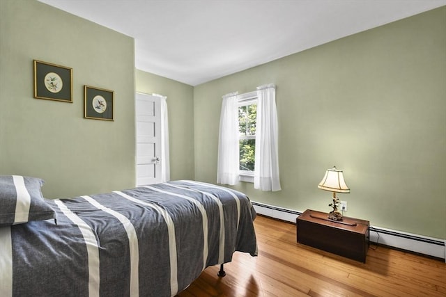 9 Aspinwall Ave, Weymouth, MA 02191 - bedroom featuring baseboard heating and wood-type flooring