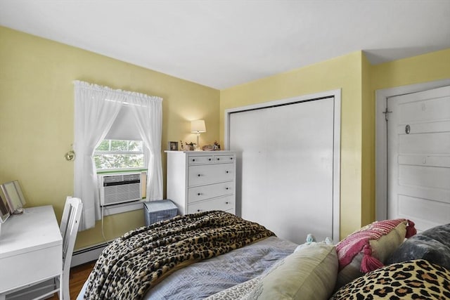 9 Aspinwall Ave, Weymouth, MA 02191 - bedroom featuring cooling unit, wood finished floors, and a closet