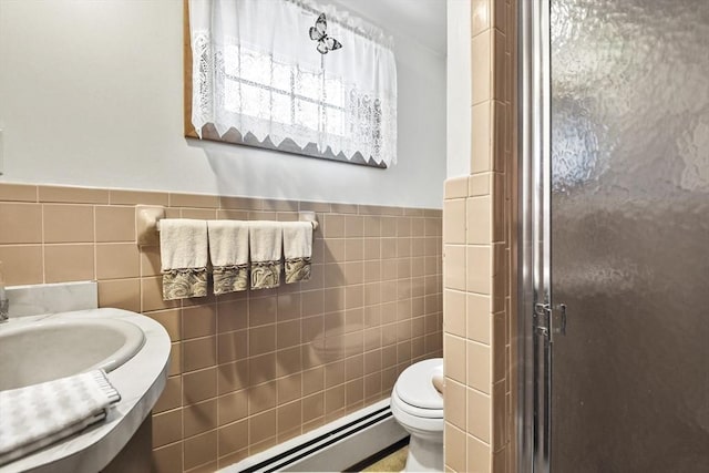 9 Aspinwall Ave, Weymouth, MA 02191 - full bath with tile walls, a shower stall, toilet, wainscoting, and baseboard heating