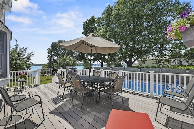 9 Aspinwall Ave, Weymouth, MA 02191 - wooden terrace featuring outdoor dining area, a fenced backyard, and a water view