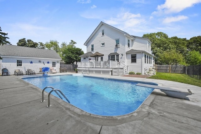 9 Aspinwall Ave, Weymouth, MA 02191 - view of swimming pool featuring a deck, a fenced backyard, a patio area, and a diving board