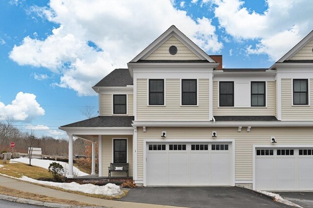 view of front facade with aphalt driveway, a porch, an attached garage, and roof with shingles