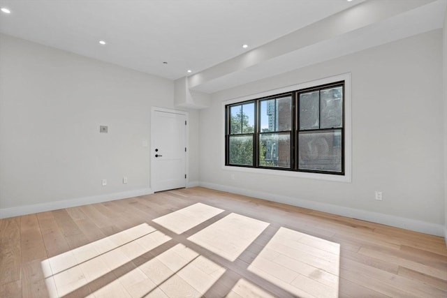 1 Marion St Unit 2, Cambridge, MA 02141 - unfurnished room featuring light wood-style flooring, recessed lighting, and baseboards