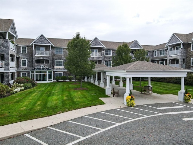 110 Dillingham Unit 215, Falmouth, MA 02540 - surrounding community with a gazebo, uncovered parking, and a yard