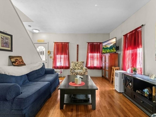 135 Border St Unit 135, Northbridge, MA 01588 - living area with plenty of natural light and wood finished floors