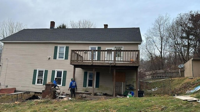 54 Marietta St, North Adams, MA 01247 - back of house featuring a wooden deck, a chimney, and a lawn