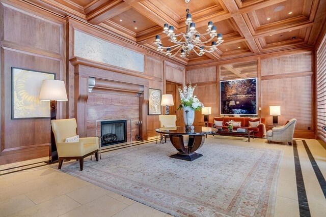 1 Dalton St Unit 4504, Boston, MA 02115 - living area with wooden ceiling with exposed beams, a chandelier, a tiled fireplace, wooden walls, and coffered ceiling