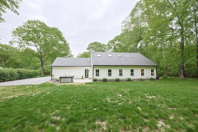 39 Chestnut St, Hopkinton, MA 01748 - back of house with a yard