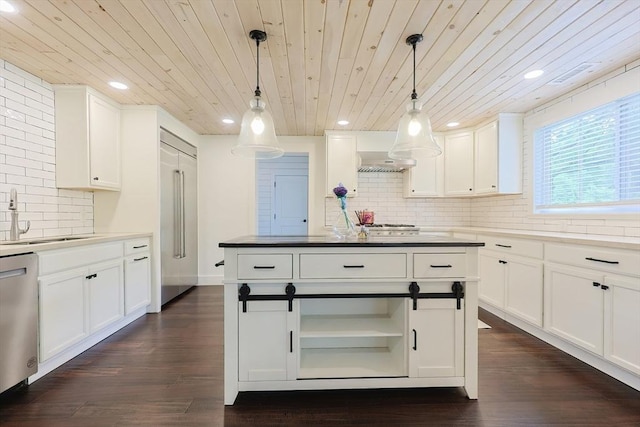 39 Chestnut St, Hopkinton, MA 01748 - kitchen with a sink, wood ceiling, dishwasher, tasteful backsplash, and built in fridge