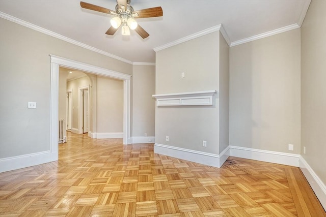 empty room with ceiling fan, crown molding, and light parquet flooring