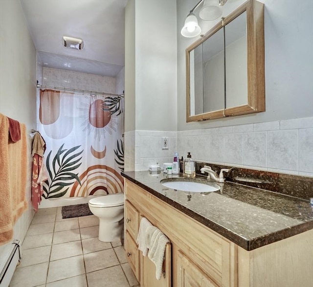 bathroom with tile patterned flooring, vanity, baseboard heating, walk in shower, and toilet