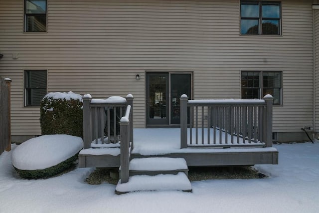 view of snow covered property