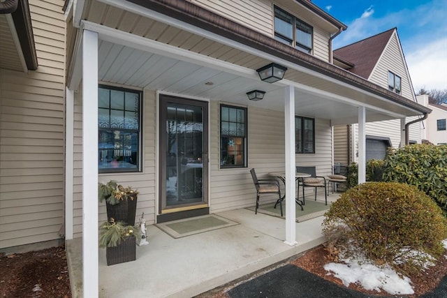 entrance to property with covered porch