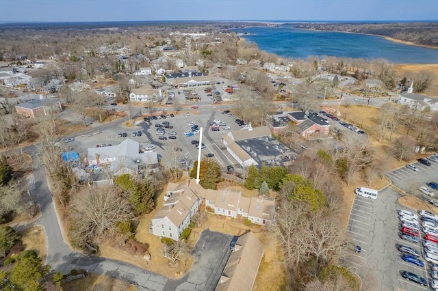 aerial view with a residential view and a water view