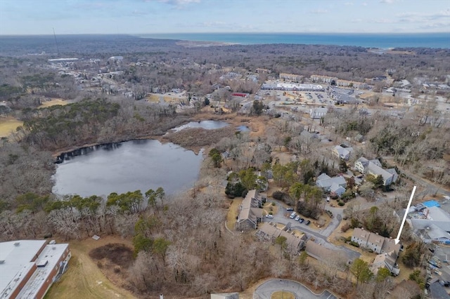 drone / aerial view with a water view