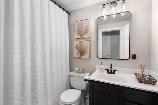 128 Parker St Unit 4C, Acton, MA 01720 - bathroom with toilet, vanity, and a shower with shower curtain