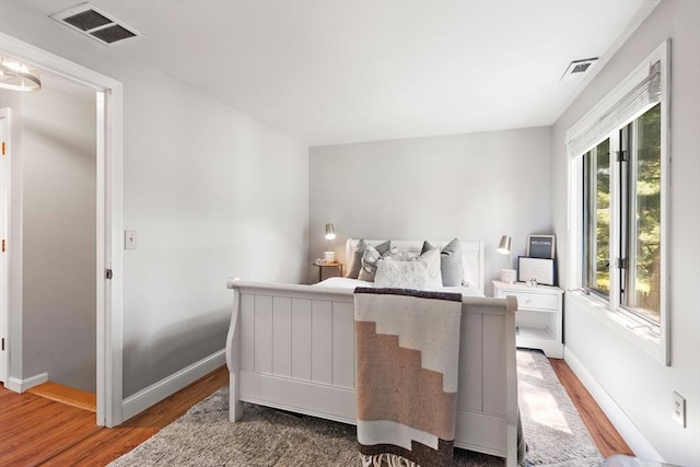 128 Parker St Unit 4C, Acton, MA 01720 - bedroom featuring wood finished floors and baseboards