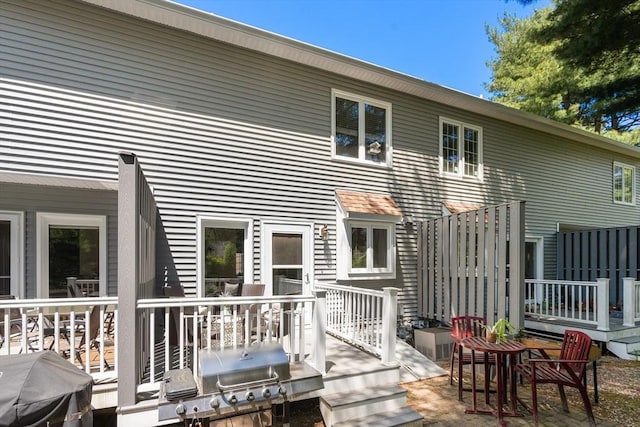 128 Parker St Unit 4C, Acton, MA 01720 - back of property with a wooden deck