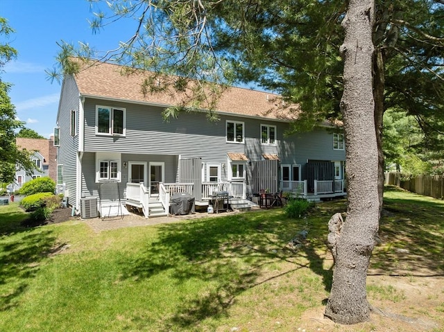 128 Parker St Unit 4C, Acton, MA 01720 - rear view of property with central AC, a deck, and roof with shingles