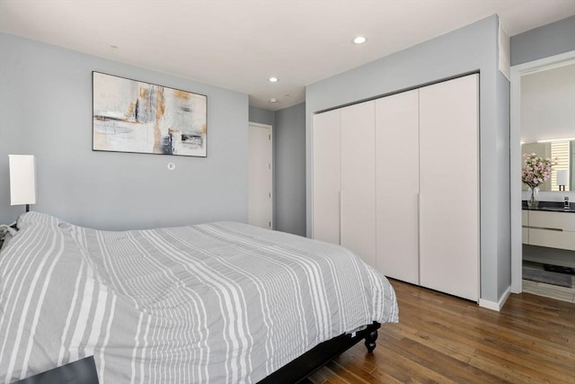 525 E 1st St Unit 5, Boston, MA 02127 - bedroom with wood finished floors, a closet, recessed lighting, and baseboards