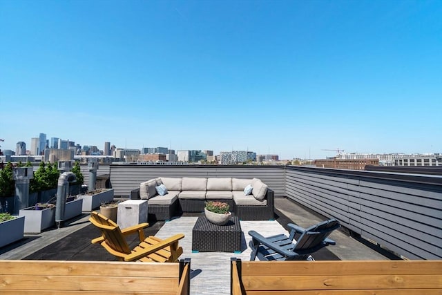 525 E 1st St Unit 5, Boston, MA 02127 - deck featuring an outdoor hangout area and a view of skyline