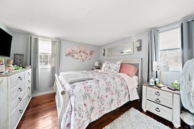 bedroom featuring dark wood-type flooring