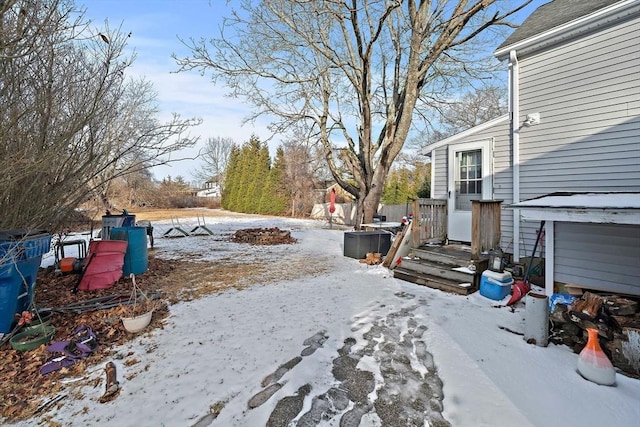 view of yard covered in snow