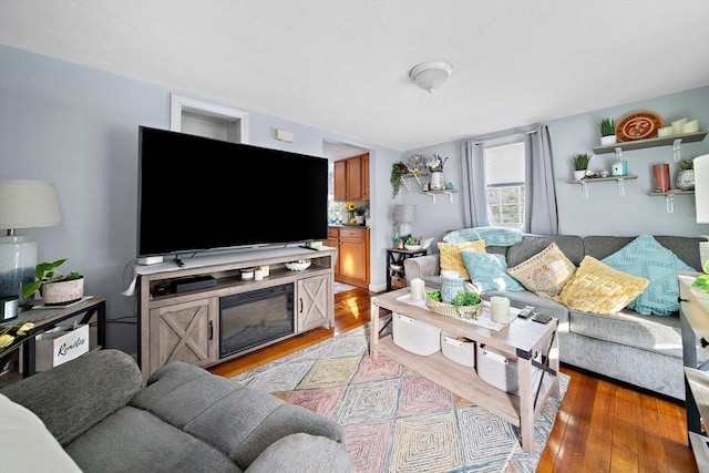 living room with light hardwood / wood-style floors