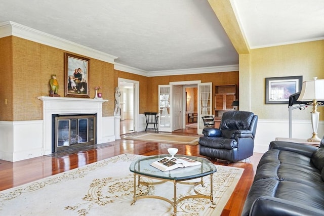 157 Washington St, Duxbury, MA 02332 - living room with crown molding, wood finished floors, and wainscoting