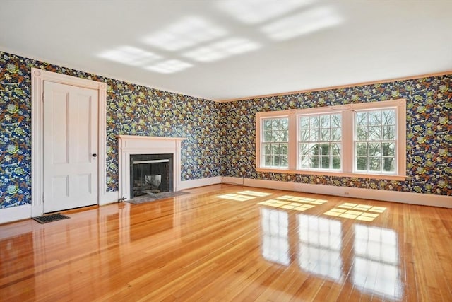 157 Washington St, Duxbury, MA 02332 - unfurnished living room featuring wallpapered walls, wood finished floors, baseboards, and visible vents
