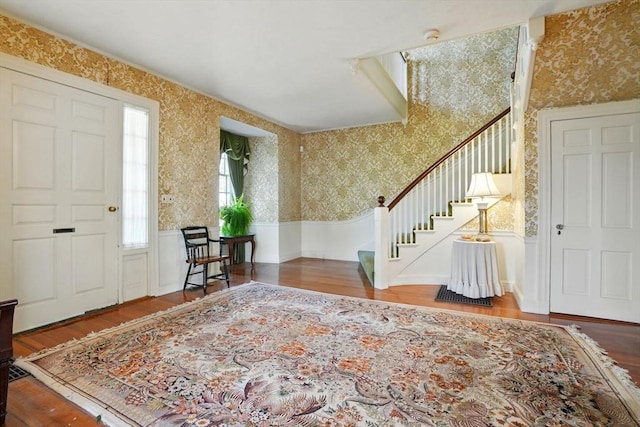 157 Washington St, Duxbury, MA 02332 - foyer featuring stairway, wainscoting, wood finished floors, and wallpapered walls