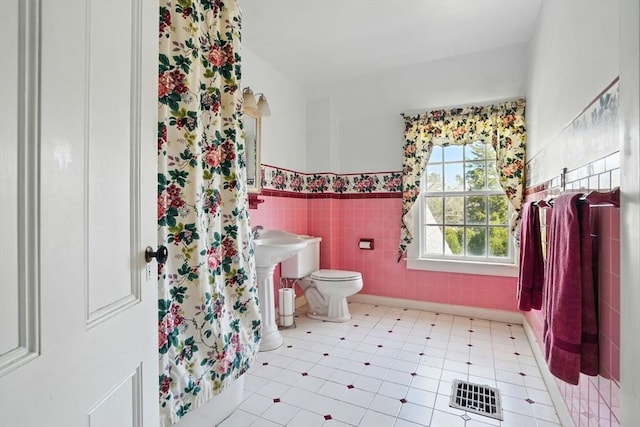 157 Washington St, Duxbury, MA 02332 - full bath featuring toilet, tile walls, visible vents, and a wainscoted wall