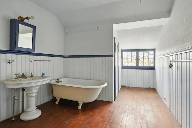 157 Washington St, Duxbury, MA 02332 - full bath featuring a freestanding tub, hardwood / wood-style floors, and a wainscoted wall