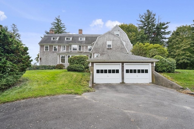 157 Washington St, Duxbury, MA 02332 - shingle-style home with a garage, a front yard, a gambrel roof, and a chimney