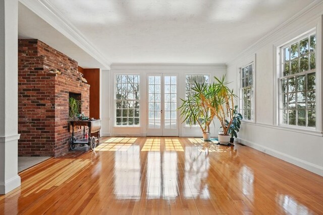 157 Washington St, Duxbury, MA 02332 - interior space featuring ornamental molding, a wealth of natural light, wood-type flooring, and baseboards