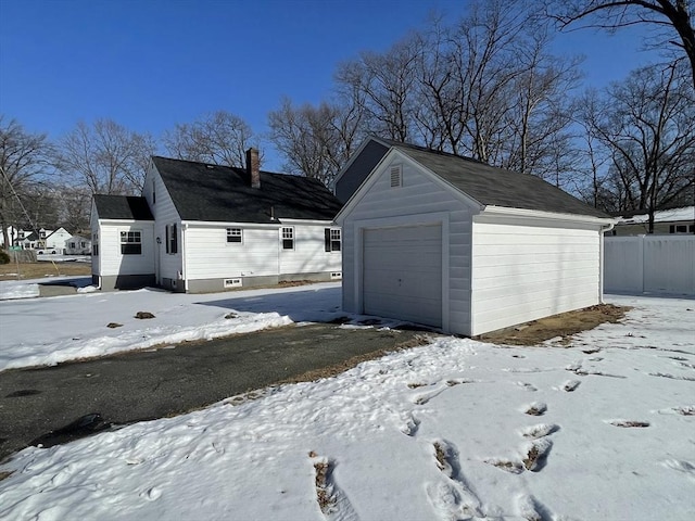 view of snow covered garage