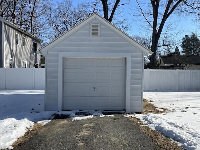 view of snow covered garage