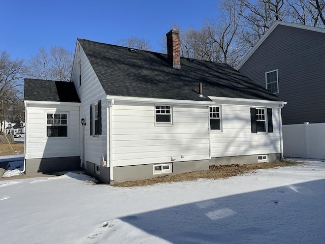 view of snow covered property