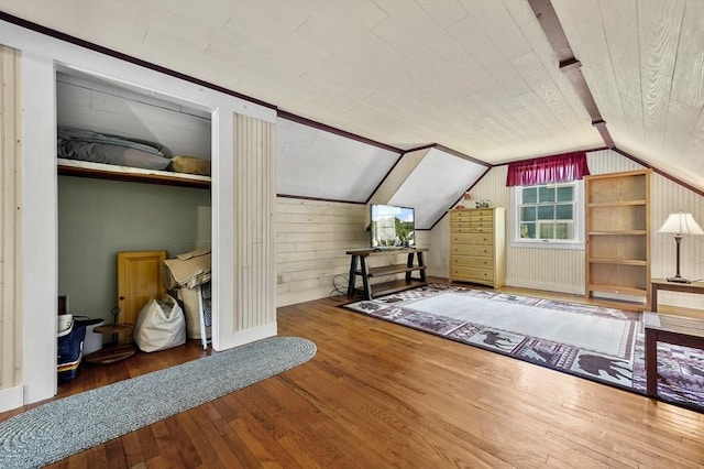 18 Stover Ct, Amesbury, MA 01913 - additional living space with wood-type flooring, lofted ceiling, and wooden walls