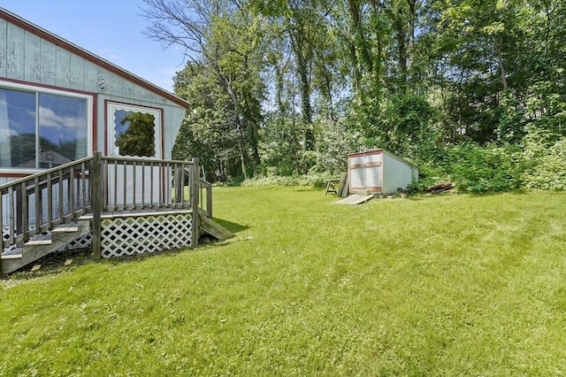 18 Stover Ct, Amesbury, MA 01913 - view of green lawn featuring a storage shed