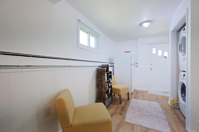 40 Atwood St, Revere, MA 02151 - entryway with estacked washer and dryer and light wood-style flooring