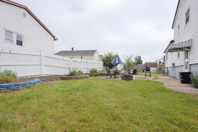 40 Atwood St, Revere, MA 02151 - fenced backyard with a patio area