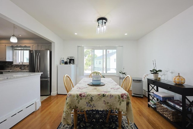 40 Atwood St, Revere, MA 02151 - dining room with a baseboard heating unit, healthy amount of natural light, light wood finished floors, and recessed lighting