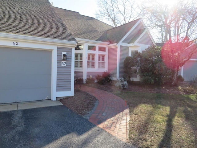 entrance to property featuring a garage