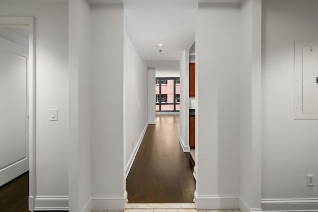 1 Charles St S Unit 604, Boston, MA 02116 - hallway featuring electric panel, wood finished floors, and baseboards