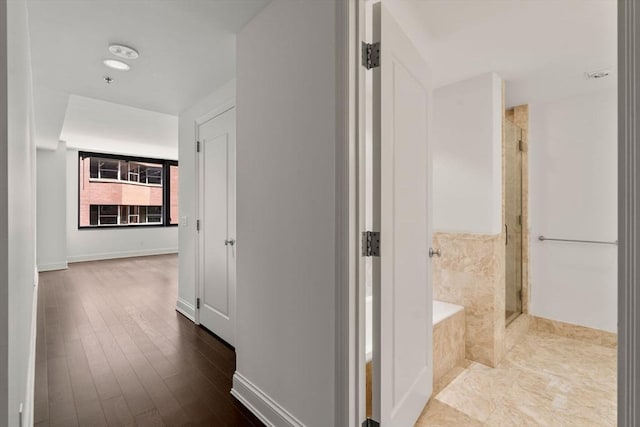 1 Charles St S Unit 604, Boston, MA 02116 - corridor with baseboards and dark wood-type flooring